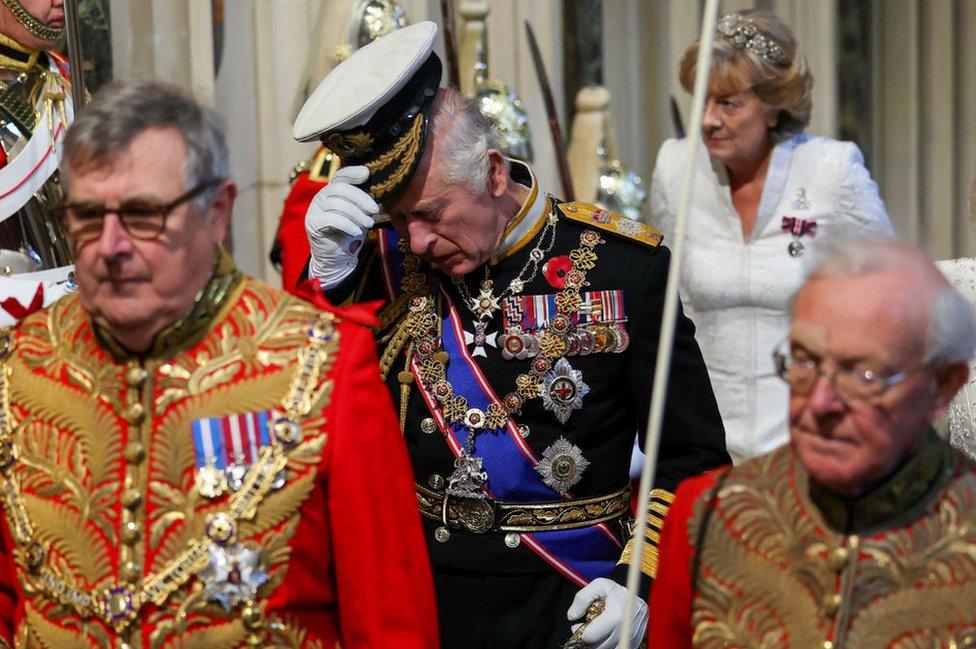 Britain's King Charles III arrives for the State Opening of Parliament in the House of Lords on November 7, 2023 in London, England.