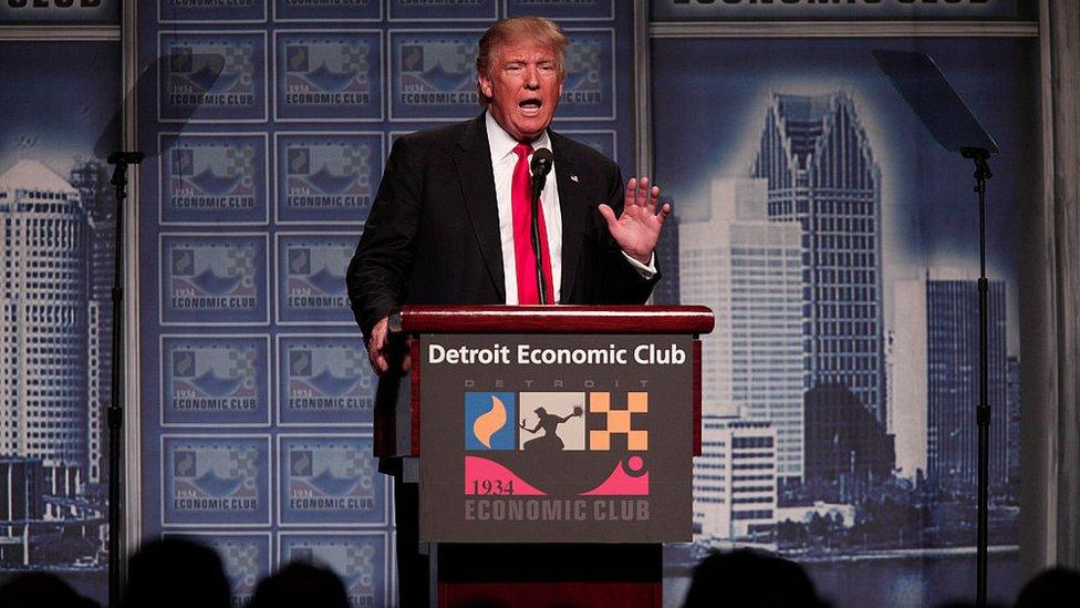 Donald Trump delivers an economic policy address detailing his economic plan at the Detroit Economic Club in August 2016