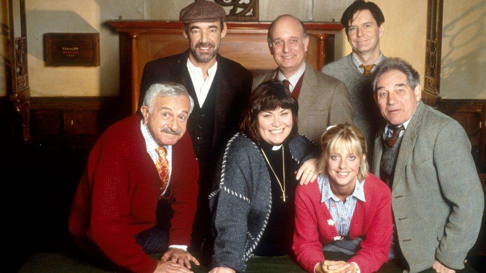 (L-R) John Bluthal as Frank Pickle, Roger Lloyd Pack as Owen Newitt, Dawn French as Geraldine Grainger, the vicar, Gary Waldhorn as David Horton, Emma Chambers as Alice Tinker, James Fleet as Hugo Horton, and Trevor Peacock as Jim Trott.