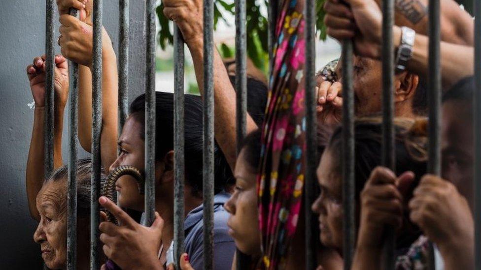 Relatives wait for information following a riot that ended with at least four prisoners killed inside Desembargador Raimundo Vidal Pessoa Public Jail, on January 8, 2017, in Manaus, Amazonas, Brazil.