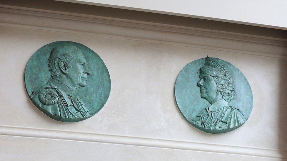 Bronze reliefs of King Charles and Queen Camilla