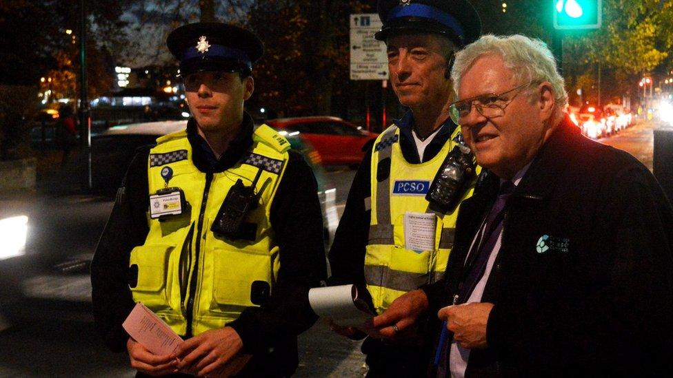 Sir Graham Bright with Cambs Police officers