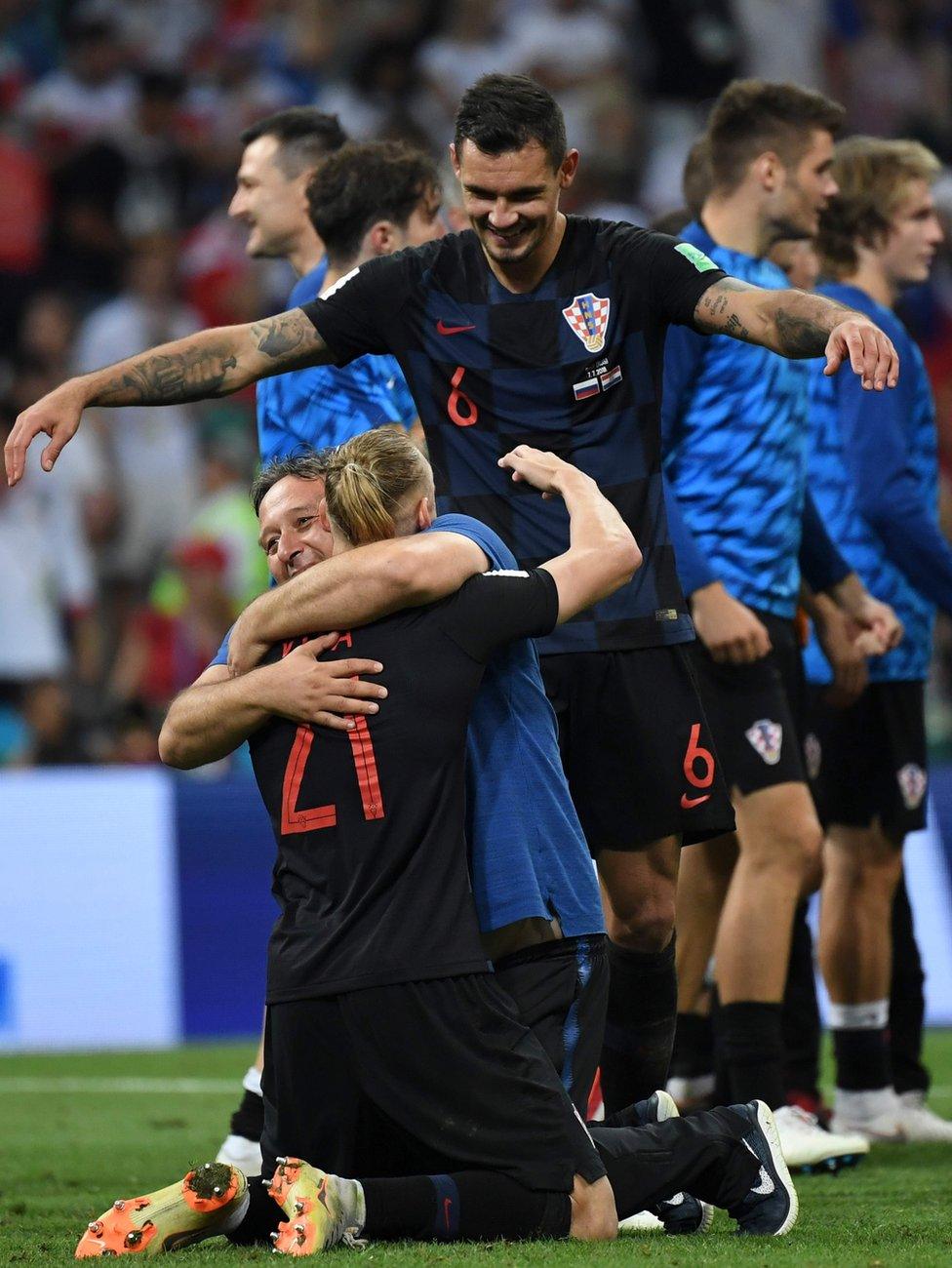 Croatia's players celebrate their win against Russia in the World Cup quarter final match, 7 July 2018