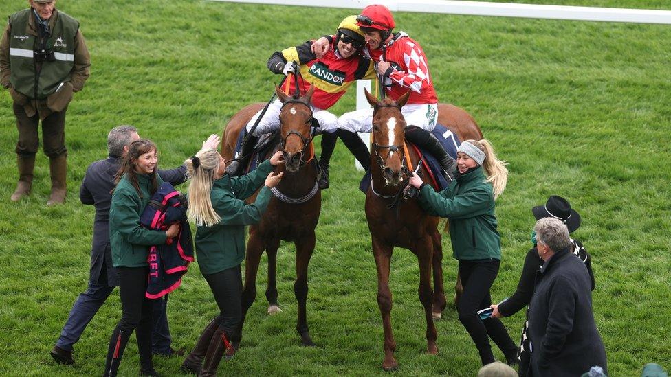 Paddy Brennan celebrates on Knight Salute and Davy Russell celebrates on Pied Piper