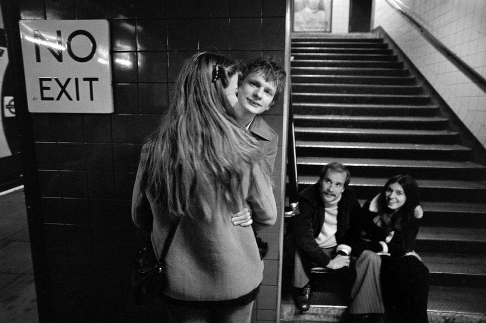 Two couples, Oxford Circus, 1979