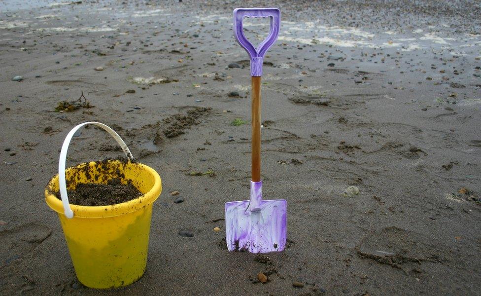 Bucket and spade on a beach