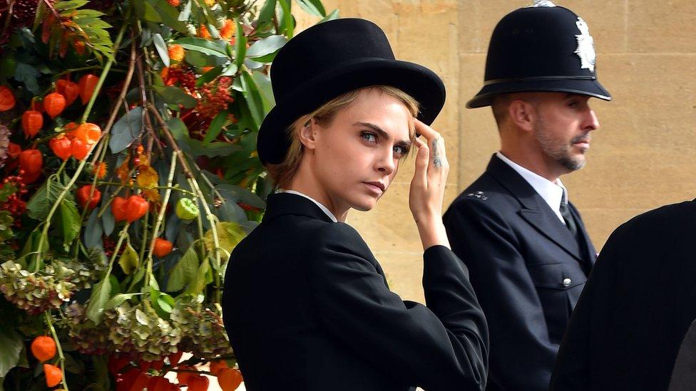 Cara Delevingne arrives at the wedding