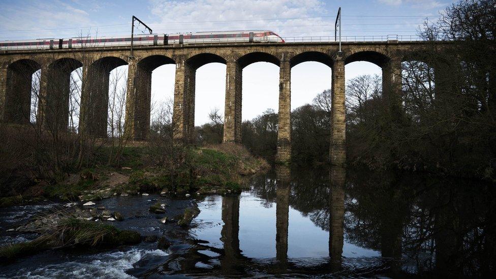 LNER train crosses a viaduct