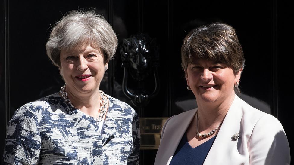 Theresa May (L), greets Arlene Foster, the leader of Northern Ireland's Democratic Unionist Party in Downing Street on June 26, 2017 in London