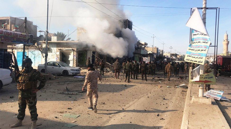 Aftermath of car bomb attack in western Iraqi border town of al-Qaim on 11 January 2019