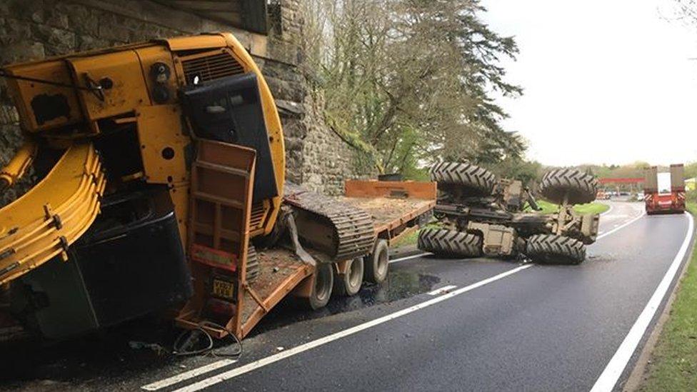 Digger and tractor strike Crossgates bridge in Powys