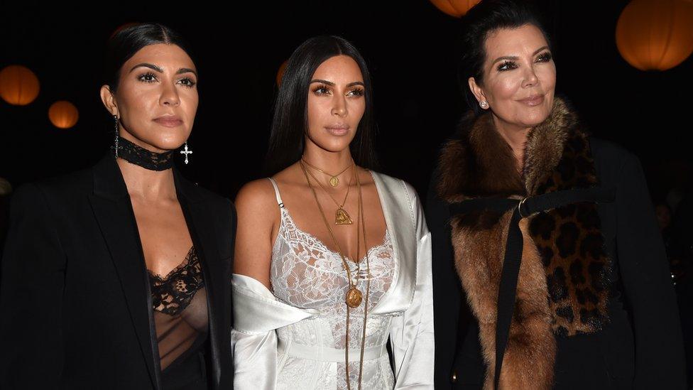 Kim Kardashian West, her sister Kourtney and mother Kris Jenner at the Givenchy show hours before the robbery