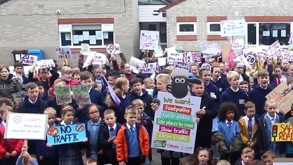 school children take part in march for safer roads