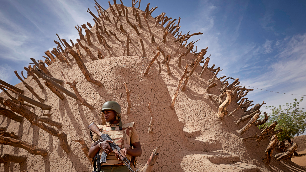 A soldier of the Malian army patrols the archaeological site of the Tomb of Askia in Gao - 10 March 2020