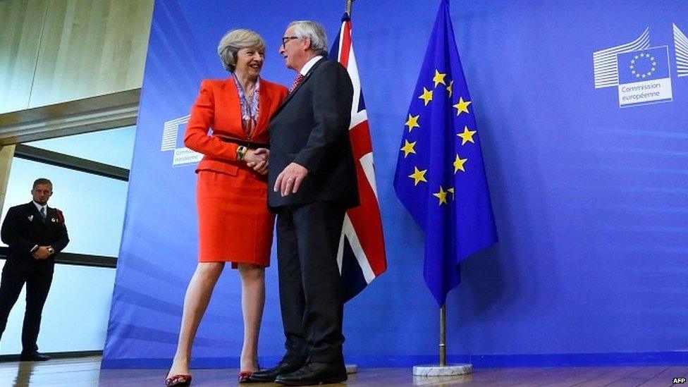 Theresa May is holding talks with Jean-Claude Juncker