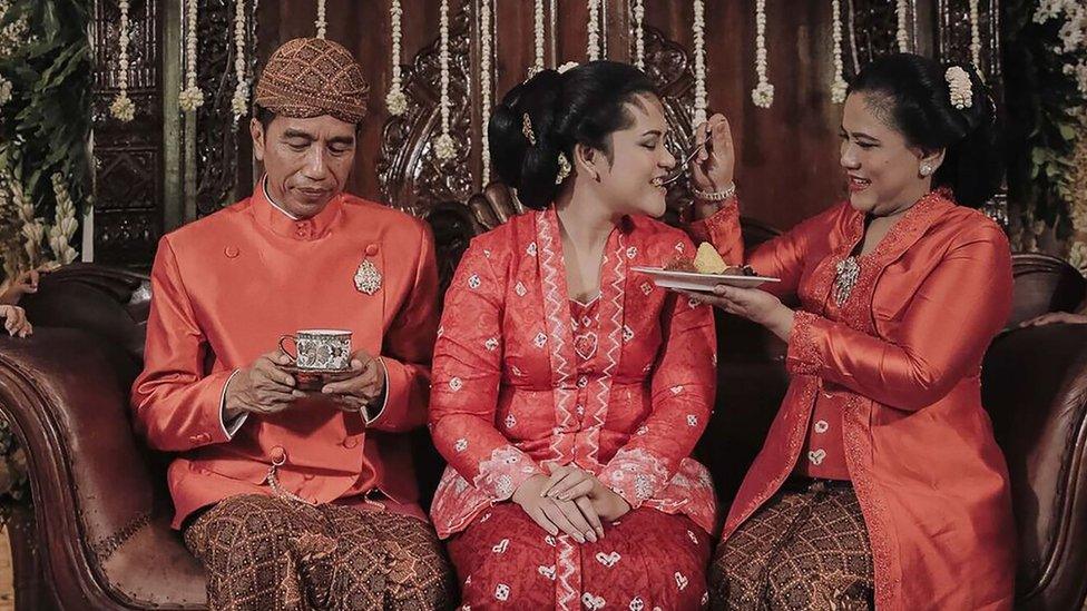 Indonesian President Joko Widodo with his daughter and wife