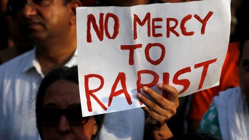 People participate in a protest against the rape of an eight-year-old girl in Kathua near Jammu, and a teenager in Unnao, Uttar Pradesh state, in Mumbai, India, April 15, 2018