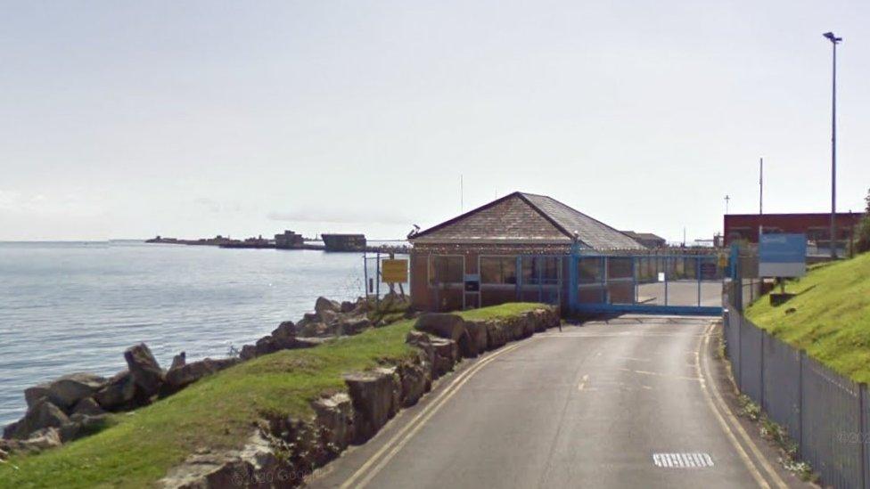 Gates to former Qinetiq site at Newtons Cove in Weymouth