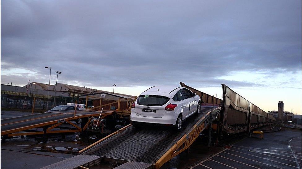 Car loads onto transporter