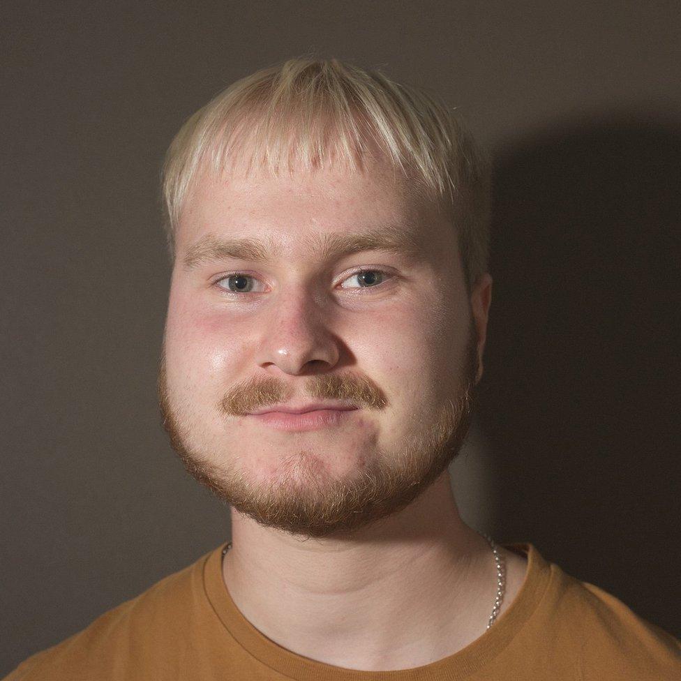 Will Bird photographed against a brown background