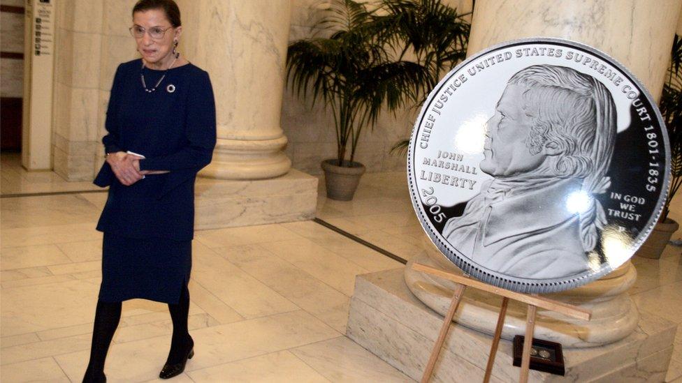 Ruth Bader Ginsburg and a coin of John Marshall