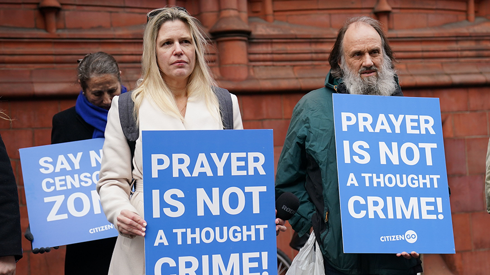 Protesters outside court