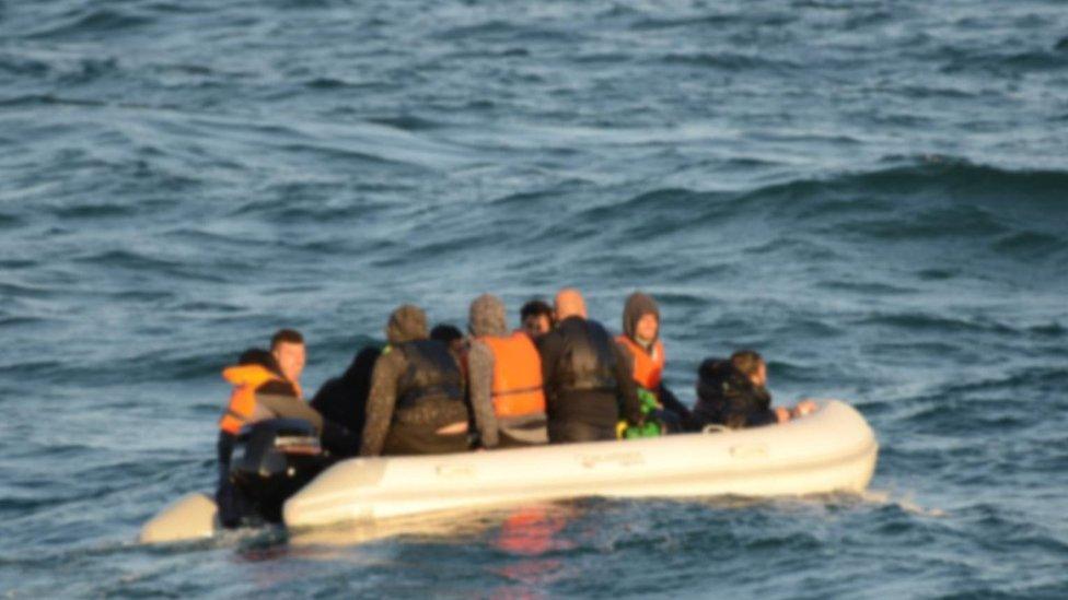 Migrants on a small dinghy