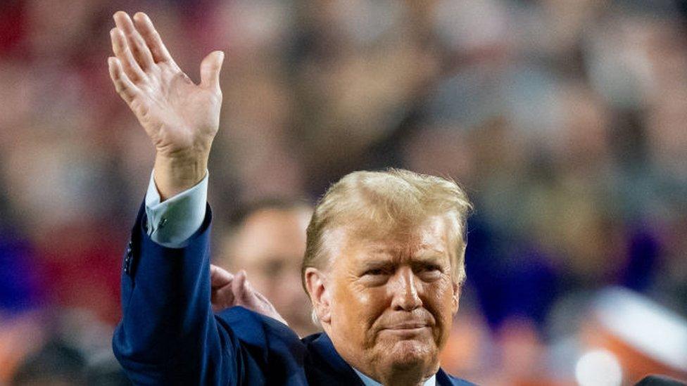 Donald Trump at a football game in South Carolina