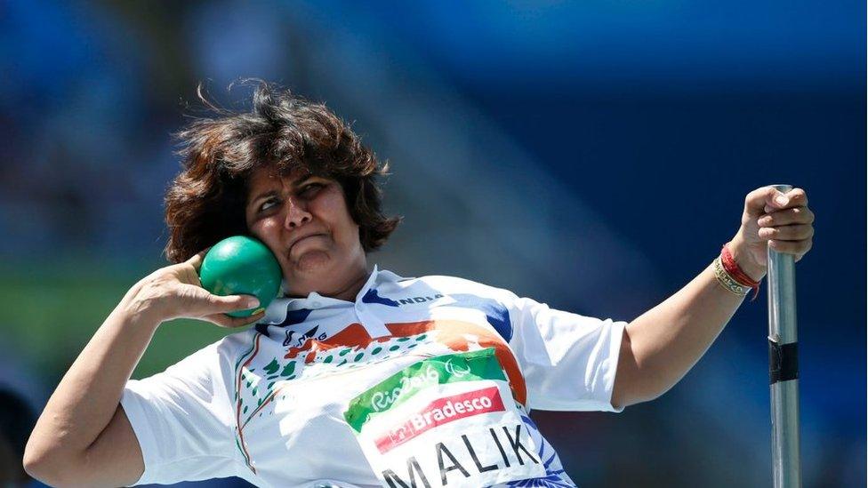 India"s Deepa Malik competes to win the silver in the women"s final shot put F53 athletics event during the Paralympic Games at Olympic Stadium in Rio de Janeiro, Brazil, Monday, Sept. 12, 2016