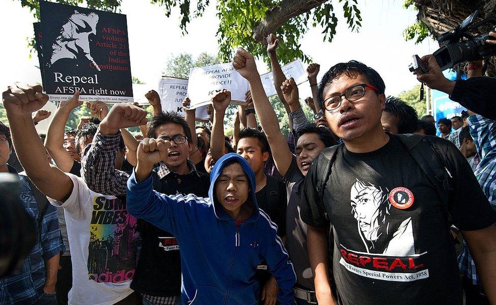 Supporters of Indian social activist from the north-eastern state of Manipur Irom Sharmila, shout slogans outside the Patiala court where Sharmila made an appearance in New Delhi on March 4, 2013. India's human rights activist Irom Sharmila, who has been on hunger strike for 12 years against an anti-insurgency law, rejected the suicide charges pressed against her by the Delhi government.