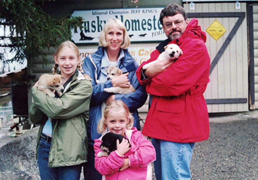 Elizabeth as a child (centre) and her family