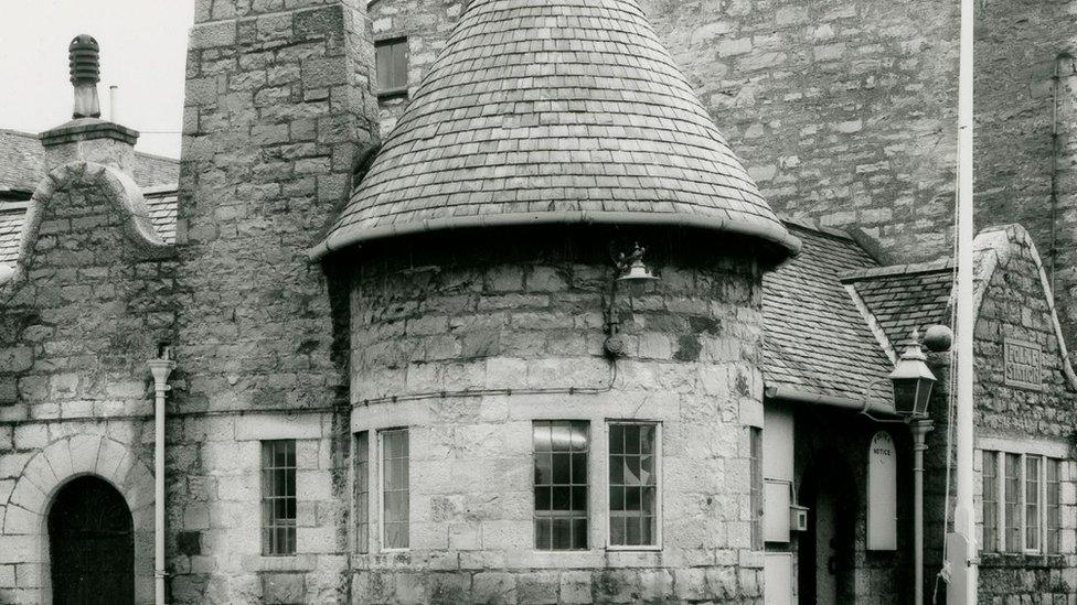 Black and white photograph of Castletown police station