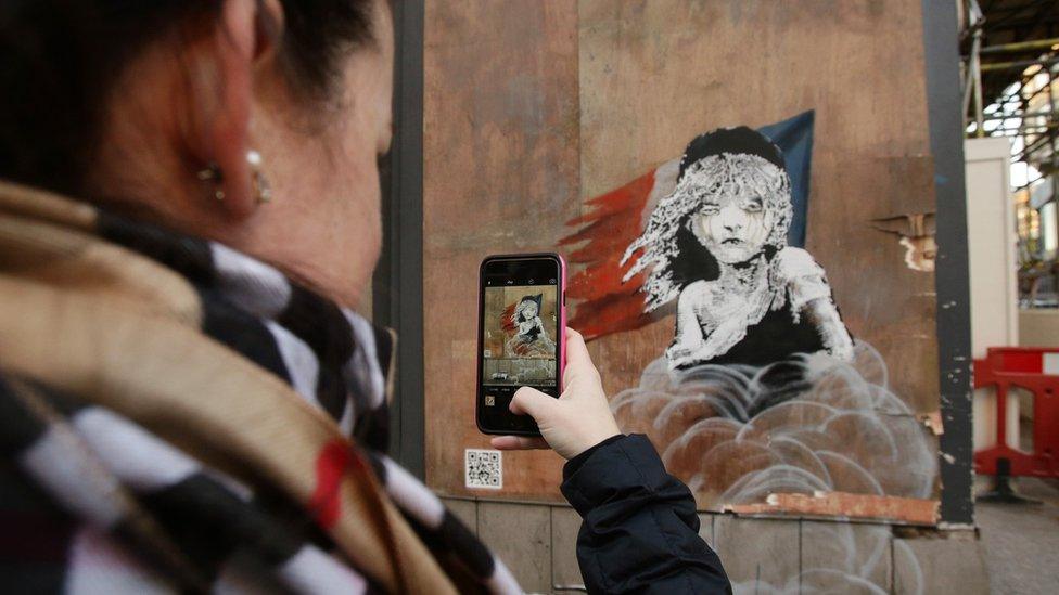 Banksy artwork of girl from Les Miserables