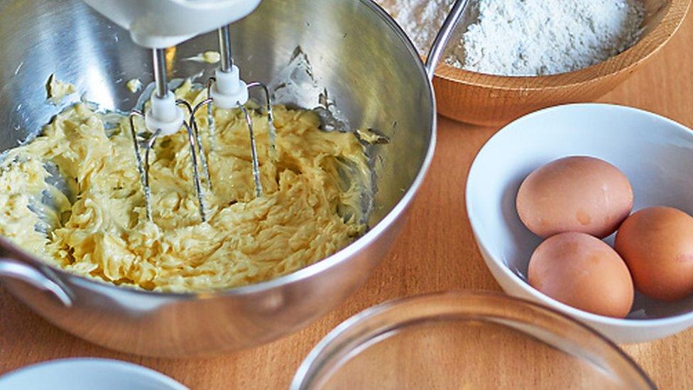 Bowls with butter, eggs