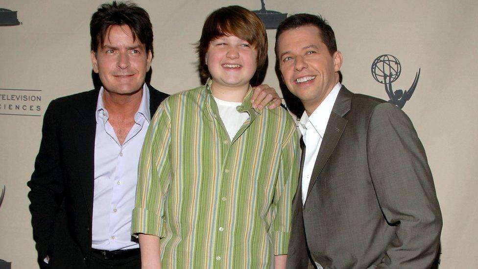 Charlie Sheen at the height of the show's success with co-stars Angus T. Jones and Jon Cryer