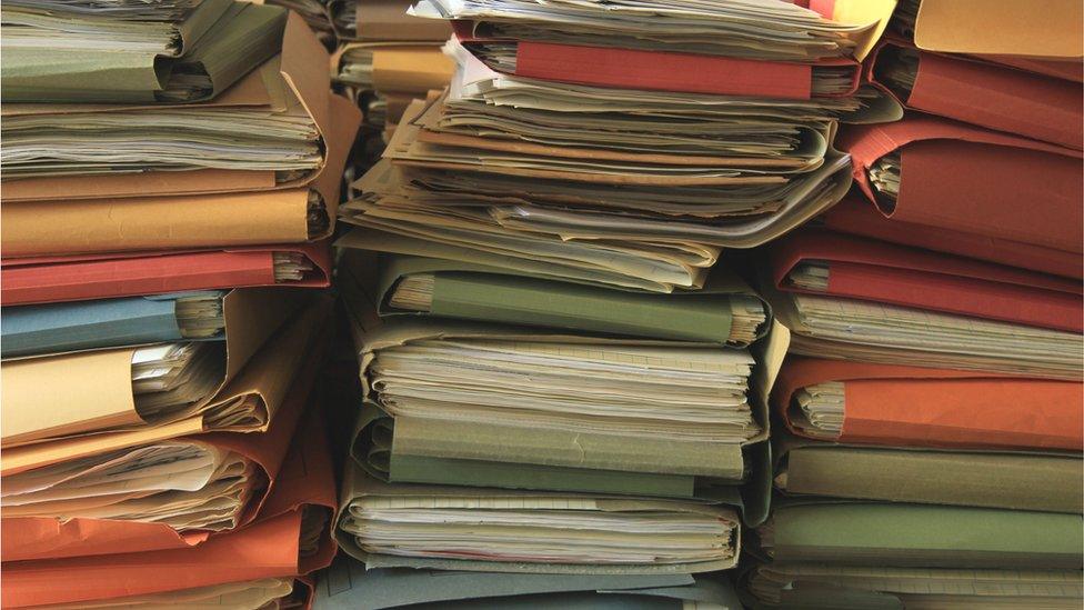 Piles of documents