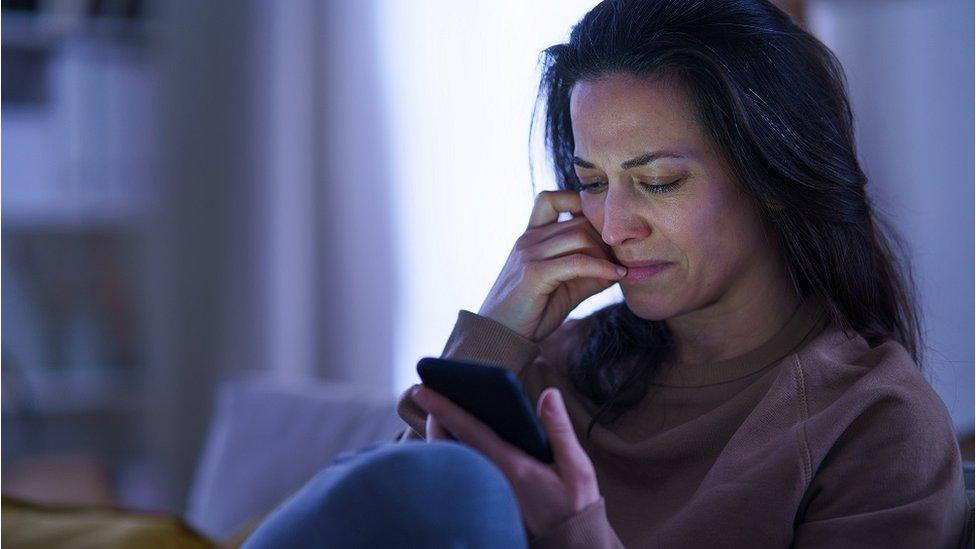 Women concerned on the phone