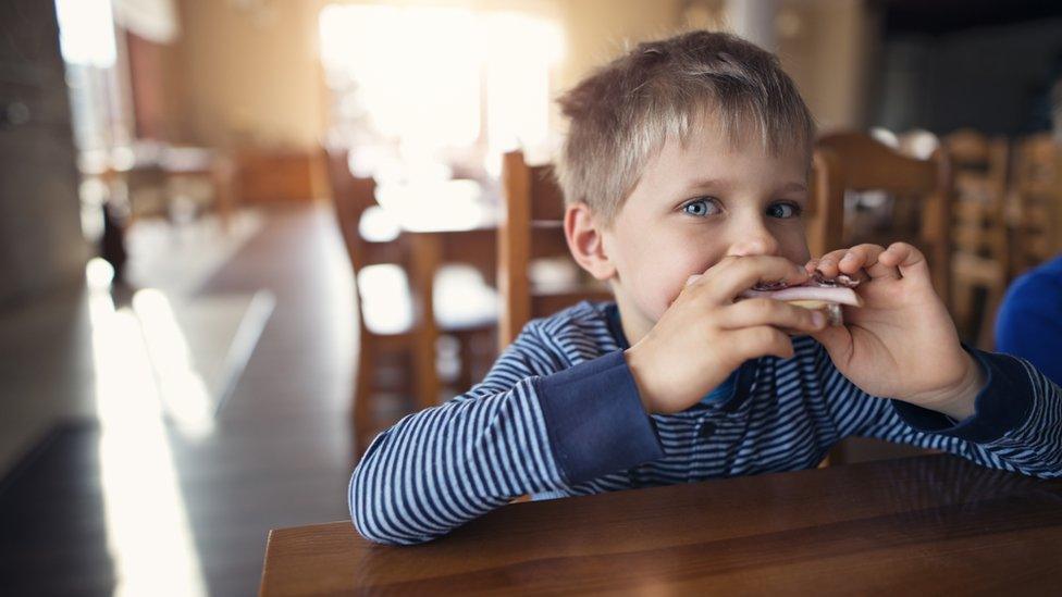 boy at table