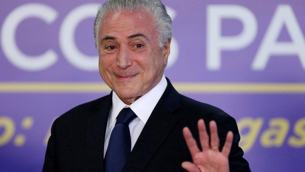 Brazil's President Michel Temer waves during a ceremony at the Planalto Palace in Brasilia, Brazil August 1, 2017.