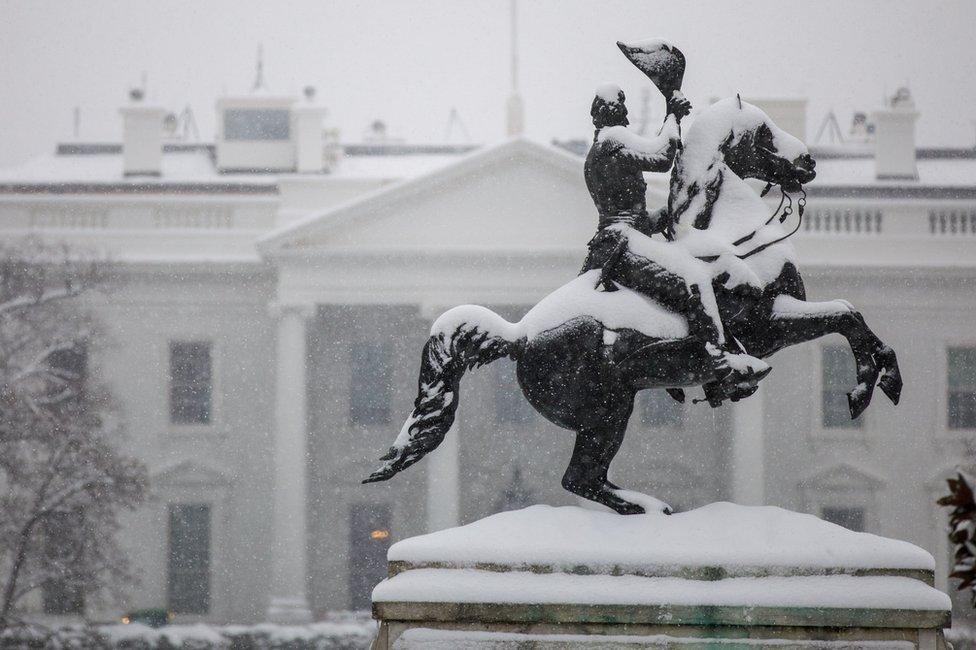 Statue of Andrew Jackson covered in snow