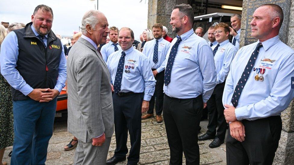 King Charles III meets members of the public during a visit to St Ives Harbour, Cornwall, to meet members of the Cornish community. Picture date: Thursday July 13, 2023