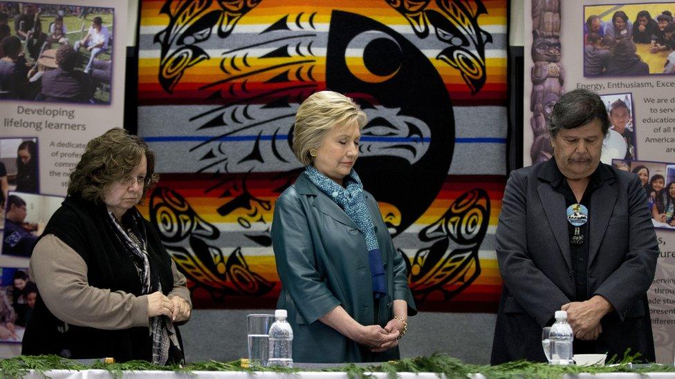 Democratic presidential candidate Hillary Clinton stands for moment of silence for victims of the attacks in Brussels during roundtable with Washington Tribal Leaders in Puyallup, Washington. 22 March 2016