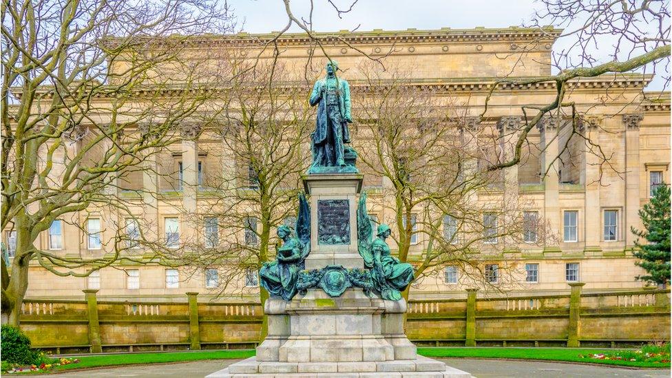 A statue of Gladstone in St John's Gardens in Liverpool