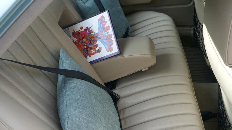 Beatles book in back seat of Stella McCartney's car