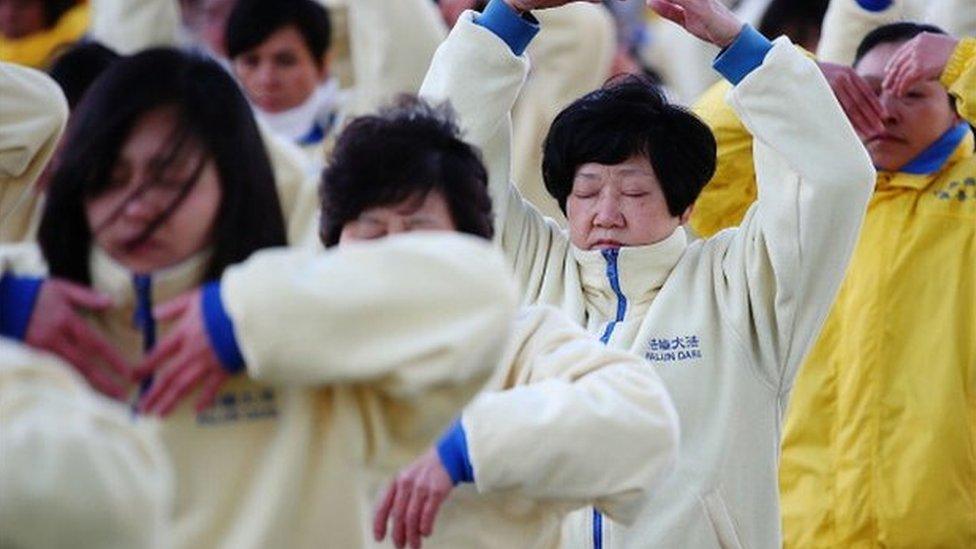 Falun Gong Practitioners meditate on the 14th anniversary of the beginning of the persecution of Falun Gong in China on 21 July 2013 in Sydney, Australia