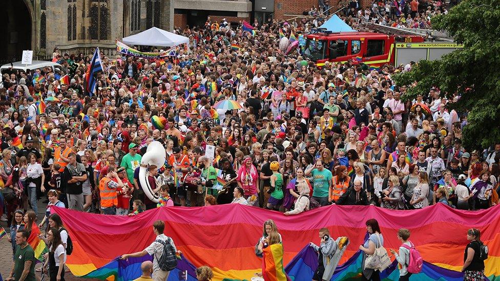 People wait for Norwich Pride march to start