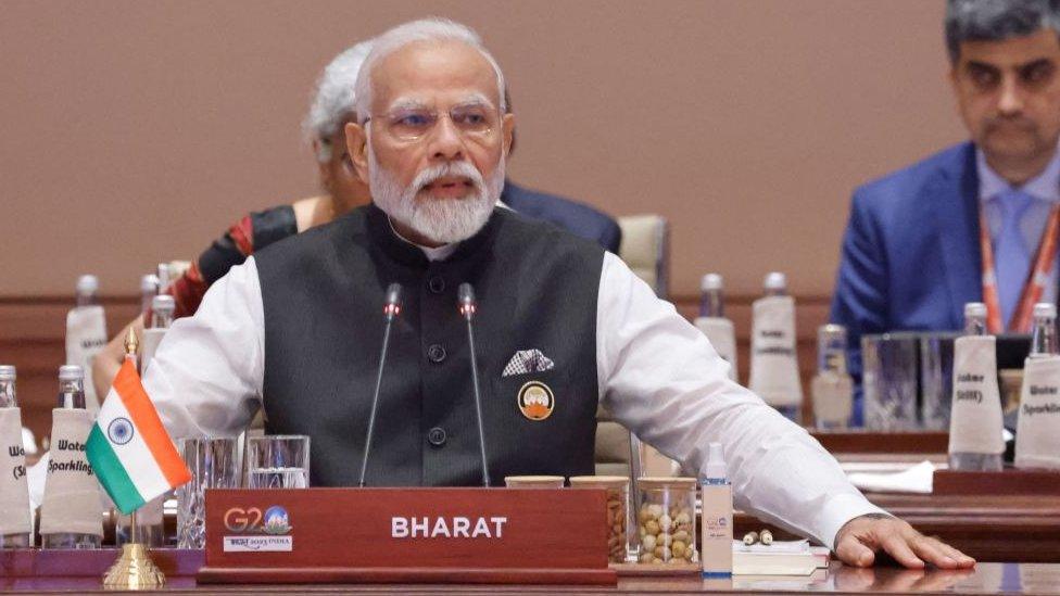 India's Prime Minister Narendra Modi (C) speaks during the first session of the G20 Leaders' Summit at the Bharat Mandapam in New Delhi on September 9, 2023. (Photo by Ludovic MARIN / POOL / AFP) (Photo by LUDOVIC MARIN/POOL/AFP via Getty Images)