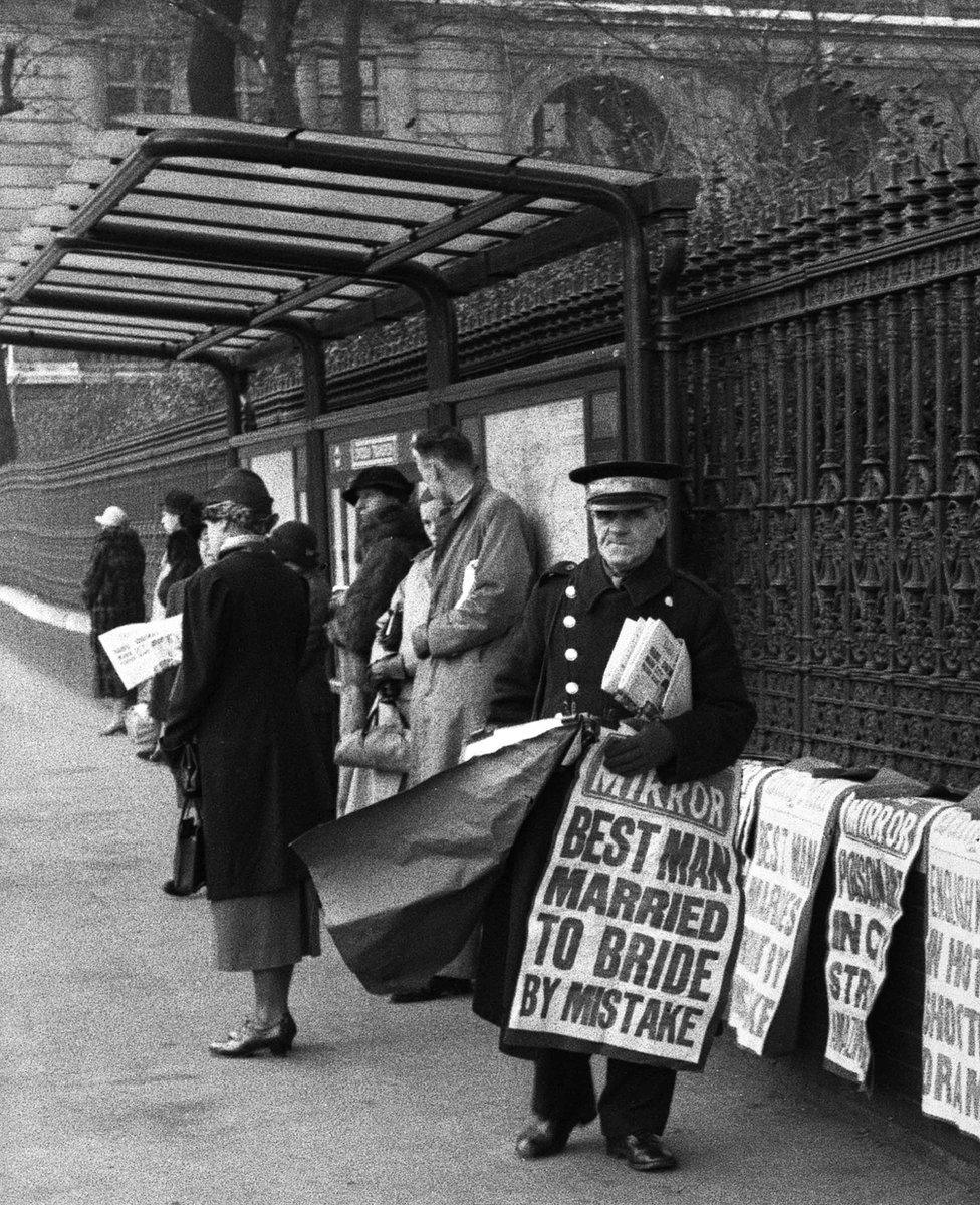 Newspaper seller on Horseguards Avenue, London, 1937