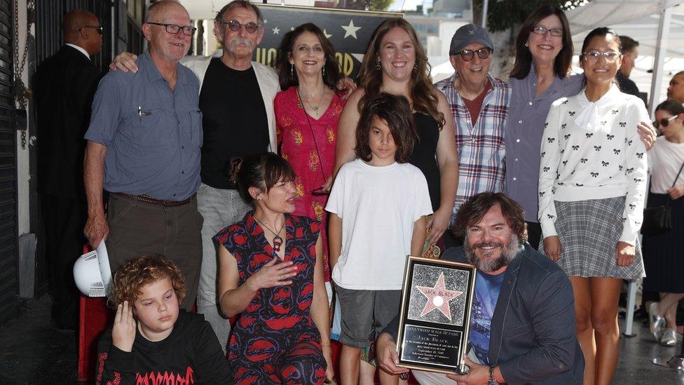 Jack Black poses with his family.