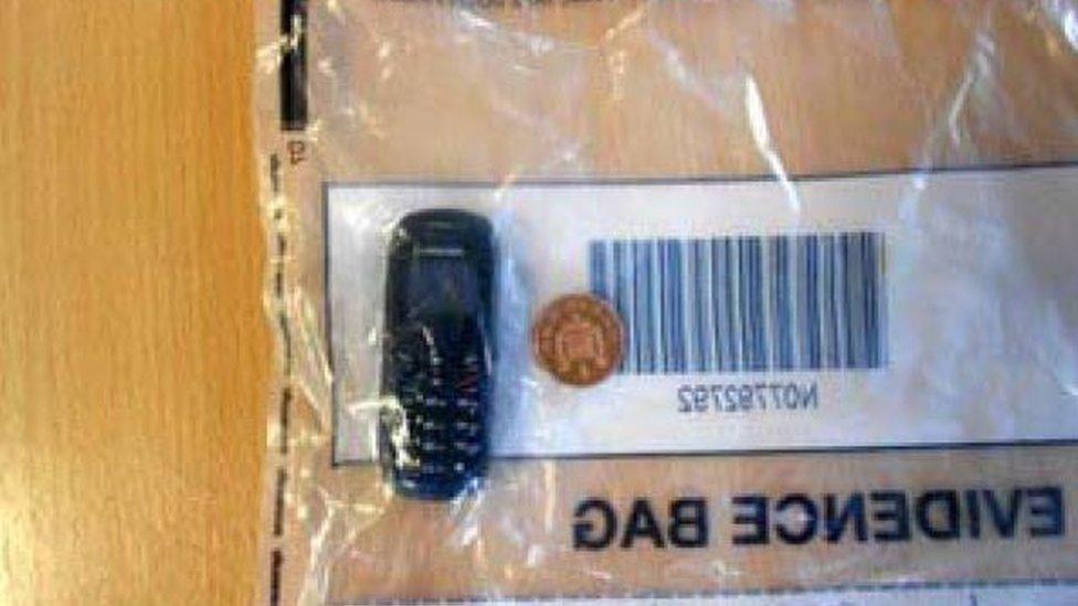 A mobile phone in an evidence bag